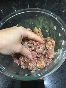 Buzymum - Mixing the meatball mix with hands