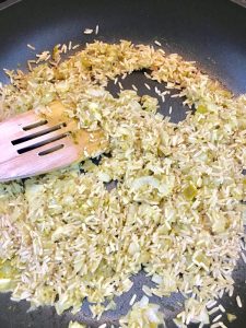 Buzymum - Rice added to onion, garlic and thai green curry paste