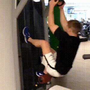 man using doing strange things in the gym
