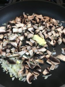 Buzymum - add mushrooms to the pan with onion and garlic