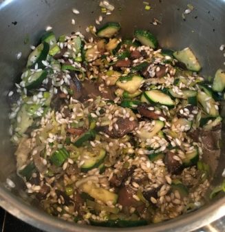 Buzymum - Risotto rice stirred into the mushroom and courgette