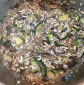 Buzymum - Stock is added to the risotto ladle by ladle